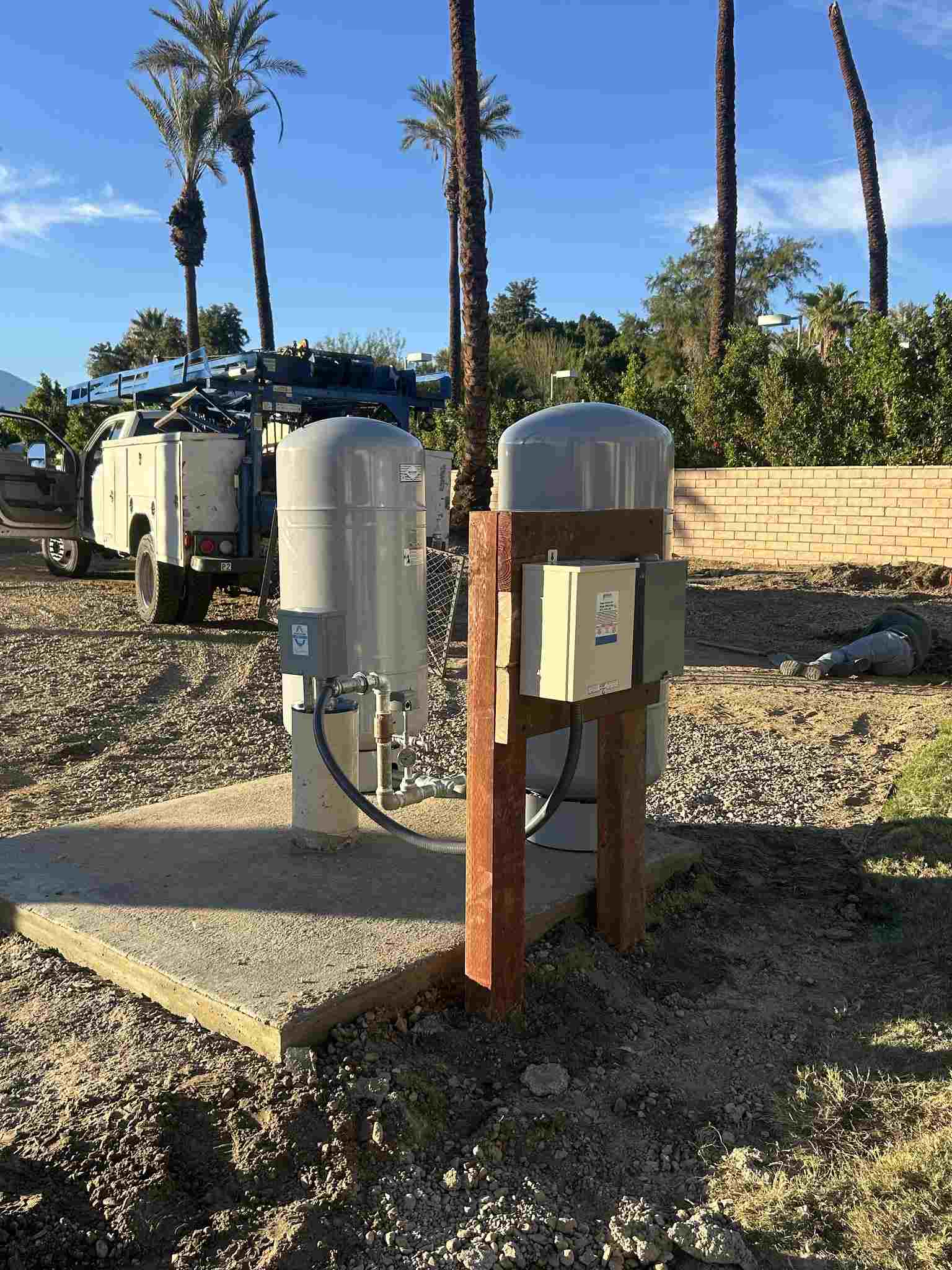 Well service truck and equipment at job site
