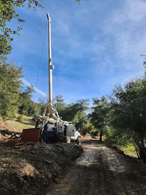 Well casing installation and development