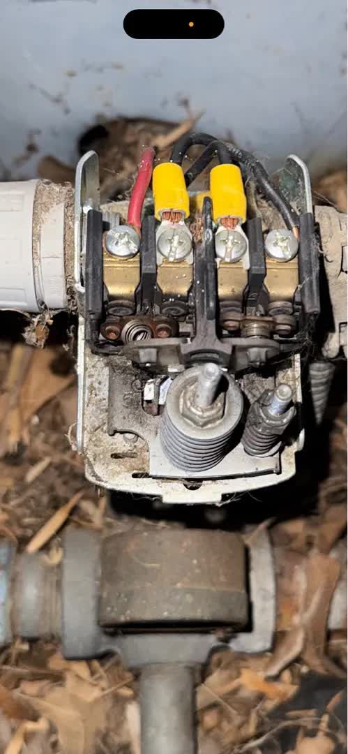 Debris-fouled well pressure switch before the tank replacement
