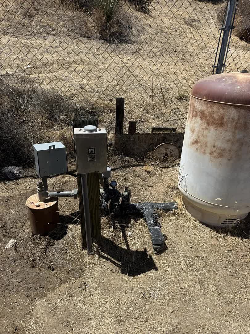 Completed well system with control box and pressure tank in Aguanga